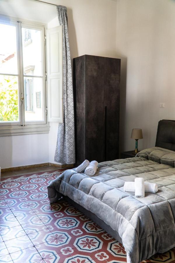 Habitación Cuádruple con balcón y baño compartido